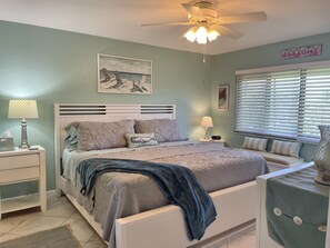 Comfy king-sized bed with beautiful views of the ocean and golf course. 