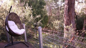 Chill out in our hanging chair on the deck