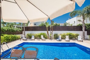 Pool and sunloungers
