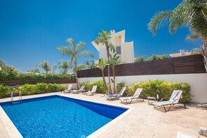 Garden with barbecue, seating area, sunloungers and private pool
