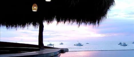 It doesn't get any better than this! View of Infinity pool and swim up bar.