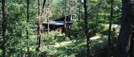 The house is set back from the road, providing quiet and seclusion.