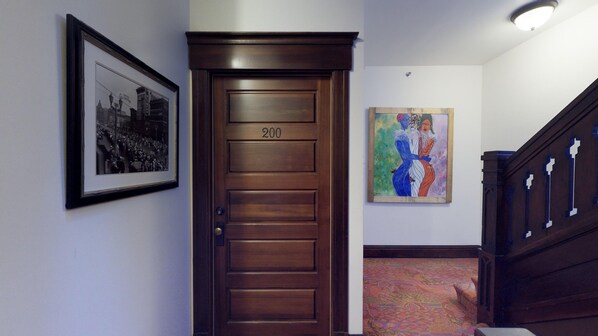 Standing outside of the front door into the condo.