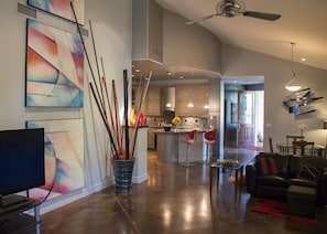 a view from the great room into the contemporary dining and kitchen 