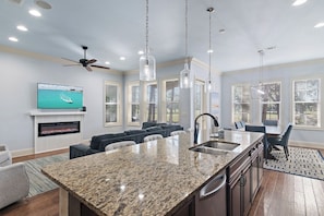 Enjoy conversing with everyone in the open kitchen