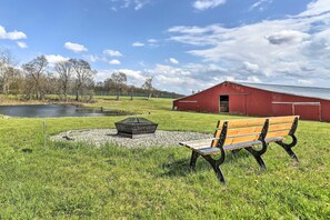 Sit by the fire pit and enjoy the lush countryside.