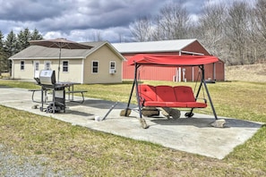 Spend the evening on the patio at this vacation rental, grilling dinner!