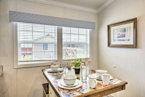 The quaint dining table is perfect for family time!