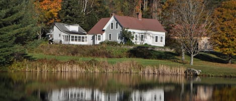 looking at house from swimming pond