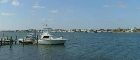 Photo off of back deck of pier and boat docks