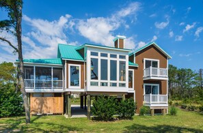 With floor to ceiling windows, you cannot escape the beauty of Chincoteague and Assateague.