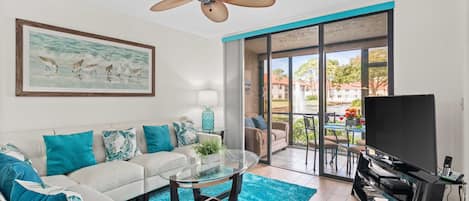 Modern updated Family Room showing AIR CONDITIONED  lanai with lake view