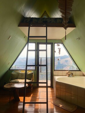 Enjoy sky-high views from the second floor bedroom and loft bed