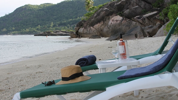 Enjoy 1 of one of Seychelles' best beaches with one of our 12 sun loungers 