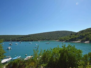 Water, Sky, Water Resources, Boat, Azure, Tree, Plant, Natural Landscape, Lake, Coastal And Oceanic Landforms