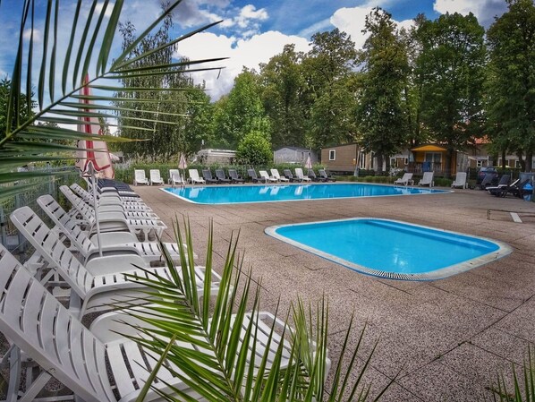 Water, Cloud, Plant, Sky, Swimming Pool, Tree, Azure, Shade, Outdoor Furniture, Leisure