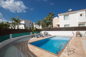 Spacious garden with barbecue, seating area, sun loungers and private pool
