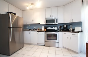 Kitchen with new stainless steel appliances
