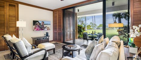 Living Area with Sofas, Armchairs, Smart TV and Access to Lanai