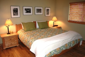 Master bedroom is supremely comfy with a king sized bed! Aspen forest outside.