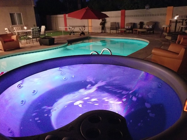 Nighttime cocktails with a soak in the hot tub or a swim in the heated pool!
