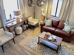Living space with leather pull out couch