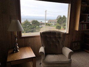 Easy chair in family room- Oceanview behind.