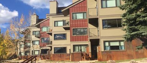 Exterior fall view - our unit has both a patio and a deck