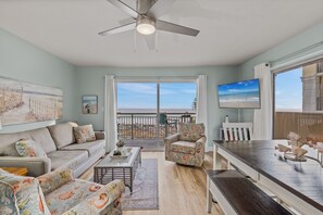 Living Room View - Enjoy this colorful & spacious living room with plenty of seats for everyone!