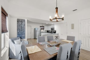 Dining room table to kitchen view
