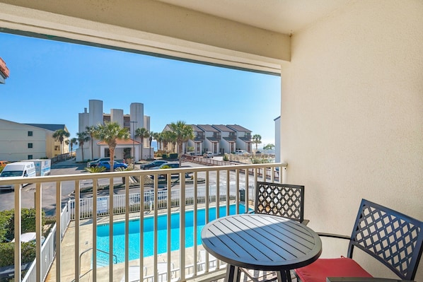 Enjoy a cup of coffee overlooking the pool