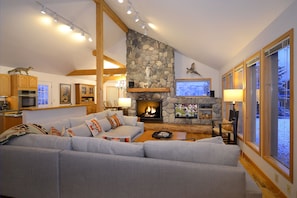 Great Room with Wood Burning Fireplace and Flat Panel TV