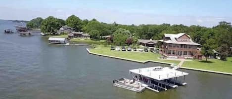 Over 300 feet of private lakefront! Huge yard, private dock, and tons of room!
