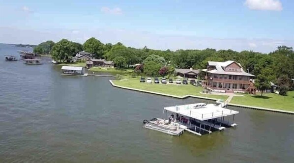 Over 300 feet of private lakefront!  Huge yard, private dock, and tons of room!