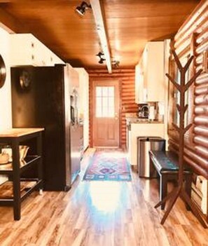 Well-equipped kitchen with stainless appliances and granite counters