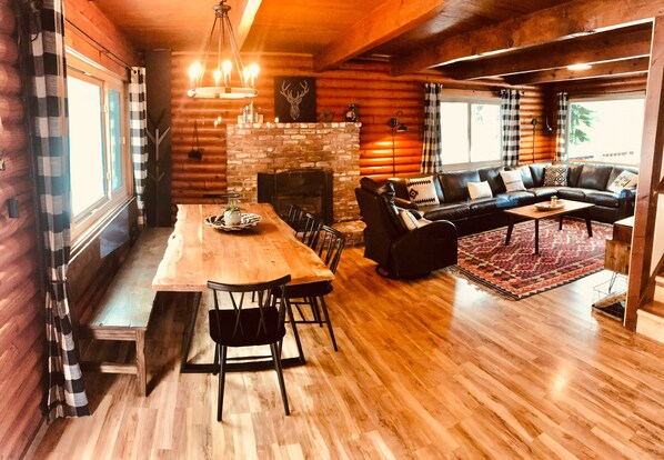 Dining nook for 8 for family meals and huge leather sofa for movie night