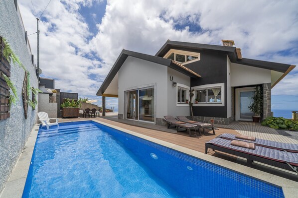 swimming pool and view to the property