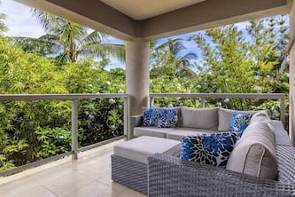 Maui villa with lanai views, gourmet kitchen, elevator, and resort amenities