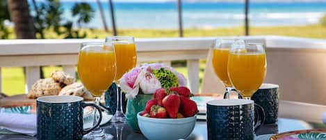 Breakfast on the upper Lanai with Ocean and property views