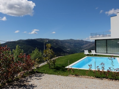 Modern house with fantastic views over the River and the Serra do Gerês