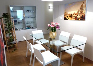 Dining room: 6 seats refined tempered glass table.