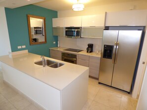 Fully equipped stocked kitchen.