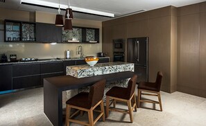 Typical kitchen area with full sized appliances.