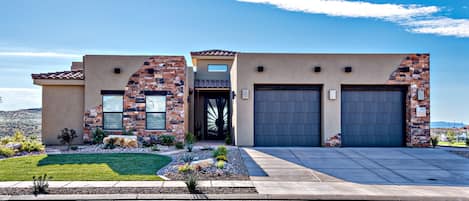 Front View - Welcome to our home, The Nest  Our 3,821 square foot luxury home includes a Casita with private bathroom, private hot tub, 4 bedrooms, 4 bathrooms and has a maximum occupancy of 16 people.