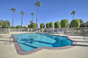 The pool and tennis courts are located just steps away.