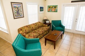 Local artwork and tropical furniture welcome our guests and keep them comfy.