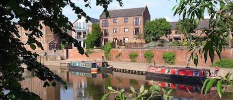 Narrow Boats moored up at the Lock gates below the apartment.