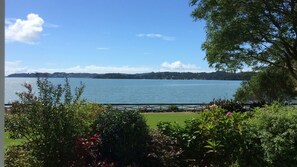 View of garden and beach from living room