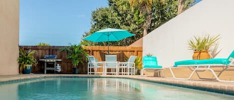 Swim under the Palm trees in the refreshing Private Pool, large Patio area