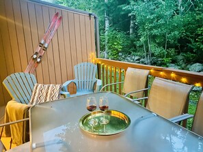 Enjoy large private deck overlooking the woods